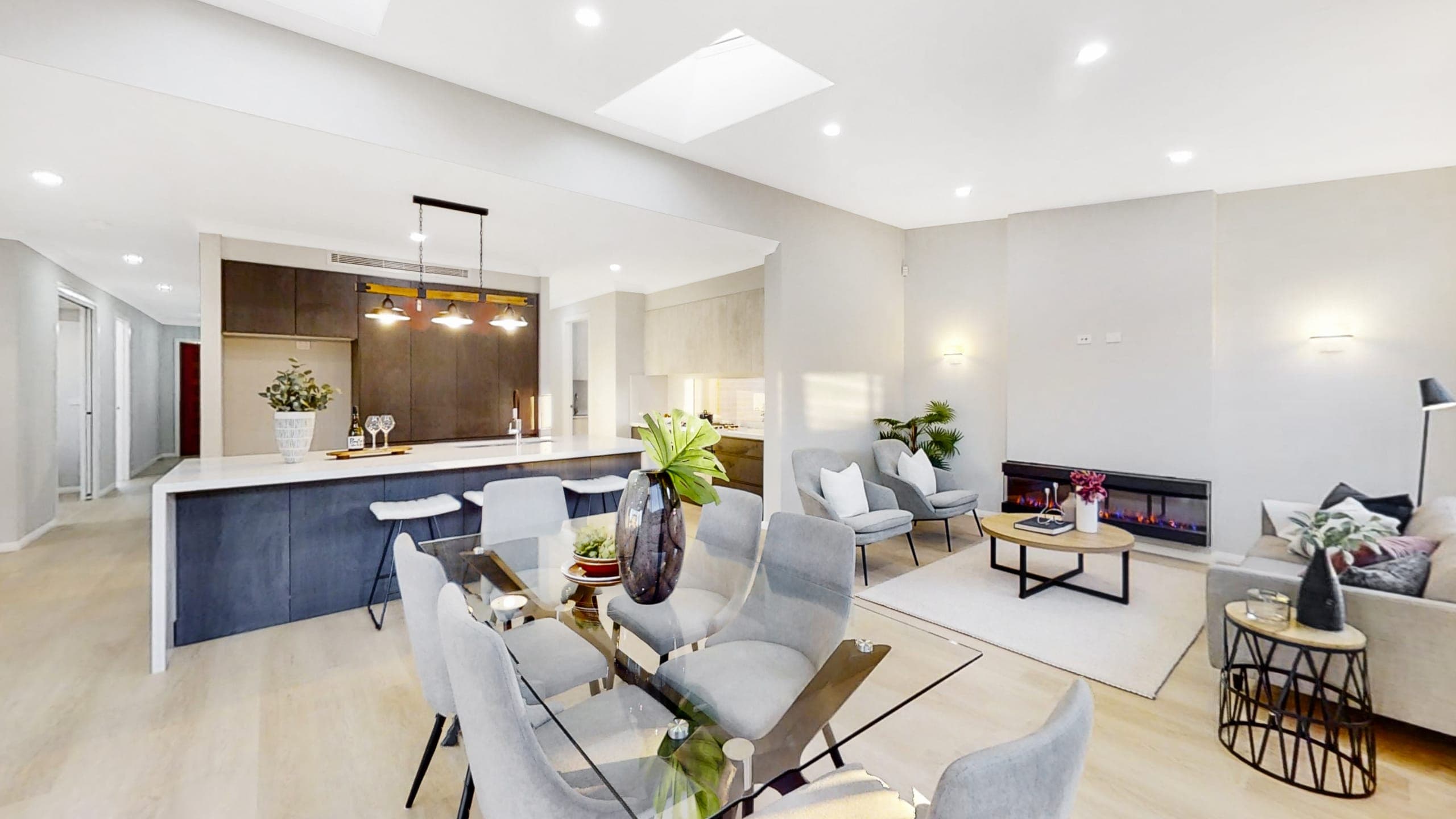 Open-plan kitchen and living room in the Gledswood Hills custom home, Sydney