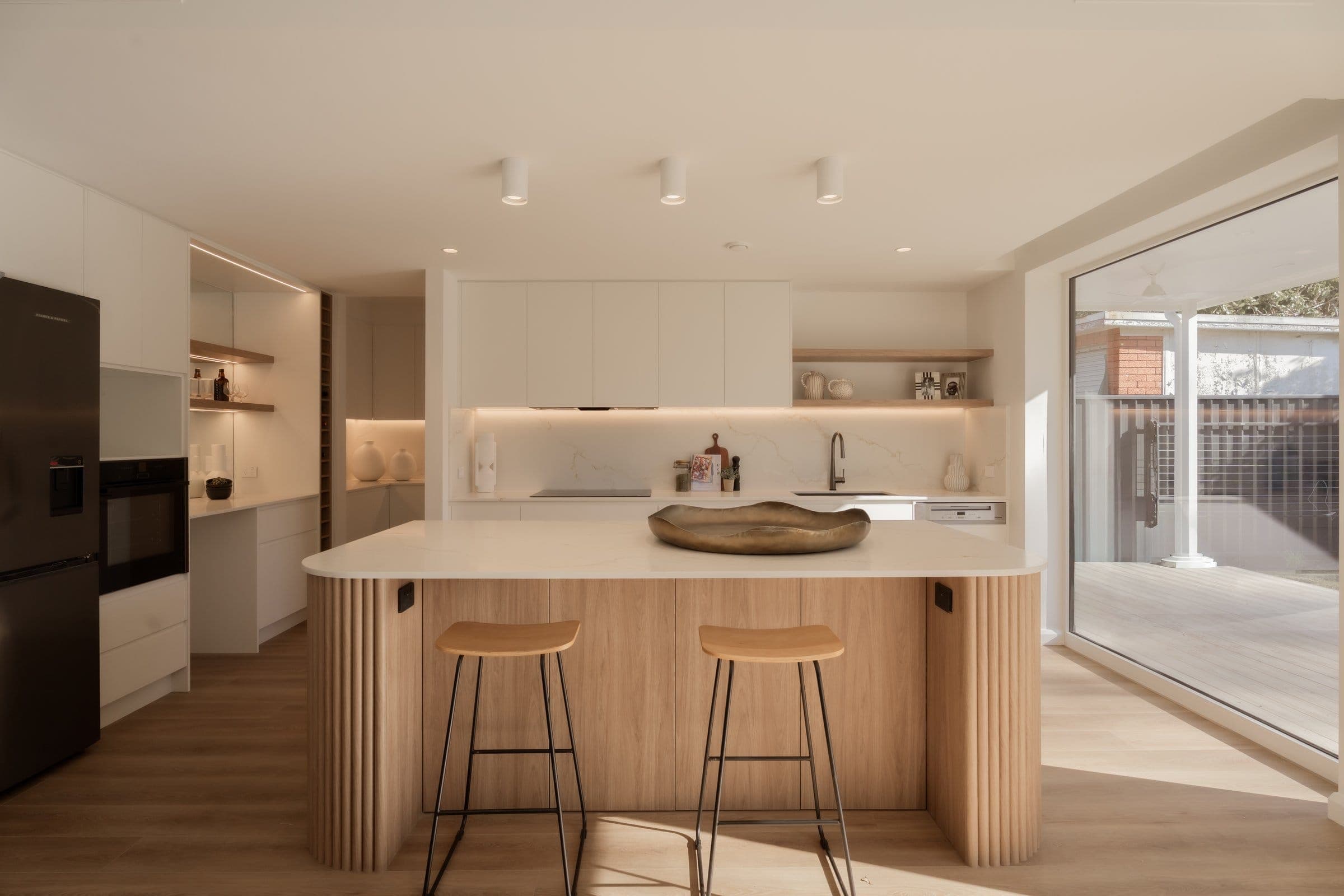 Finished Marvel Homes kitchen with warm timber joinery and natural light