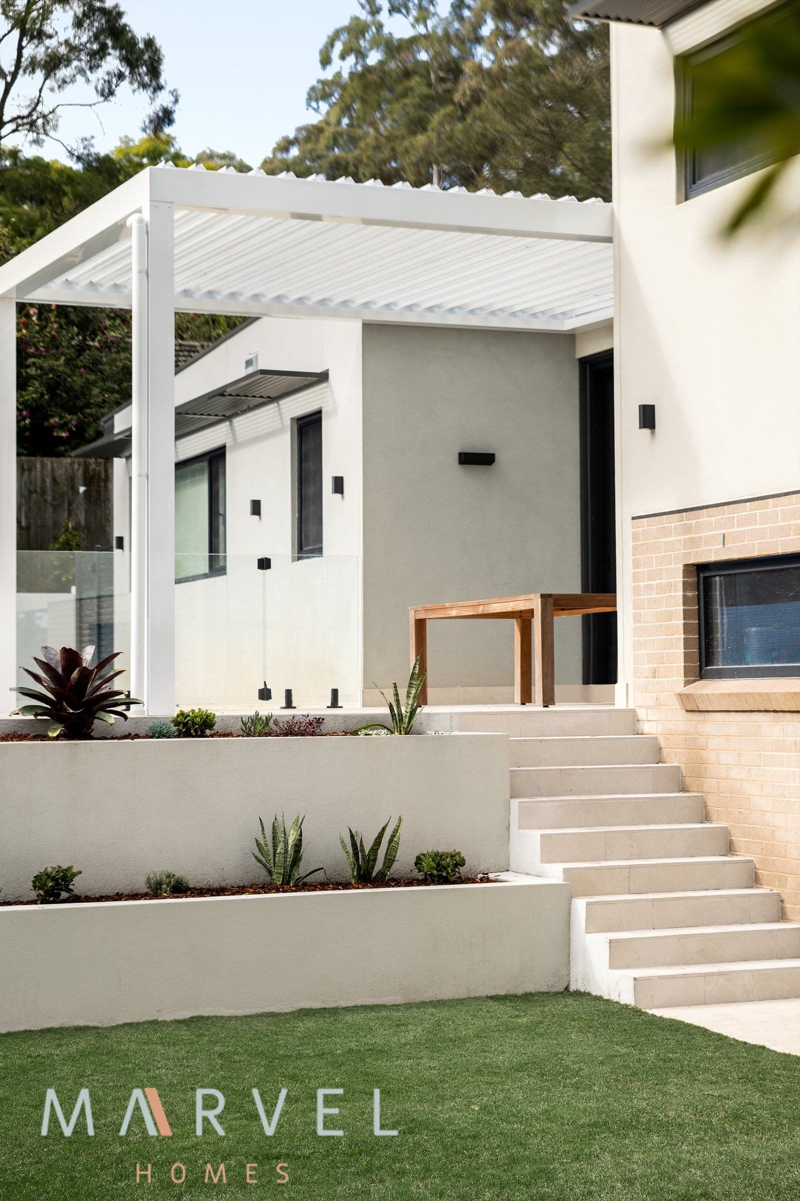 Warrawee alfresco with timber bench and landscaped steps